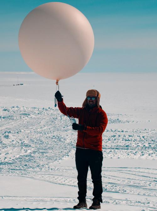 Alexis letting up an atmospheric measurement balloon.